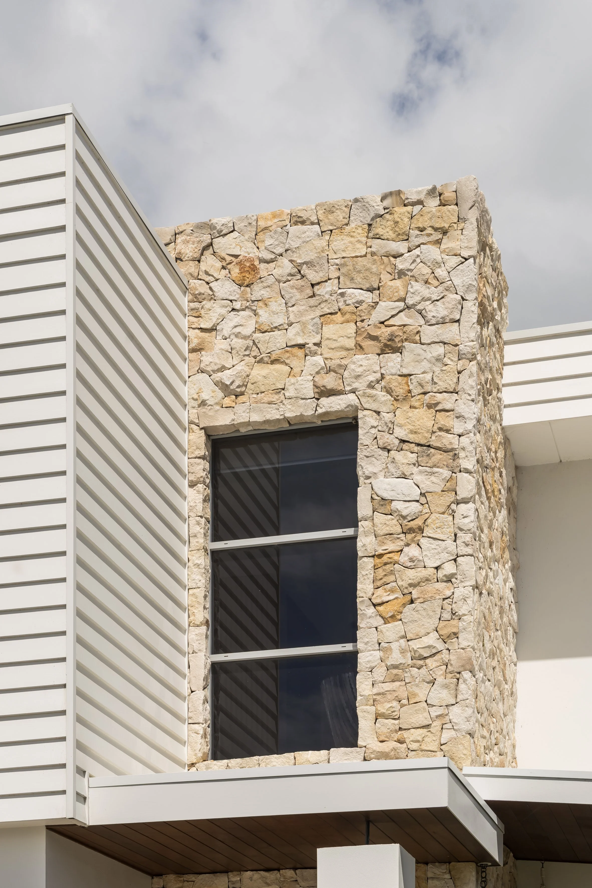 Natural stone facade detail, Shell Cove home renovation