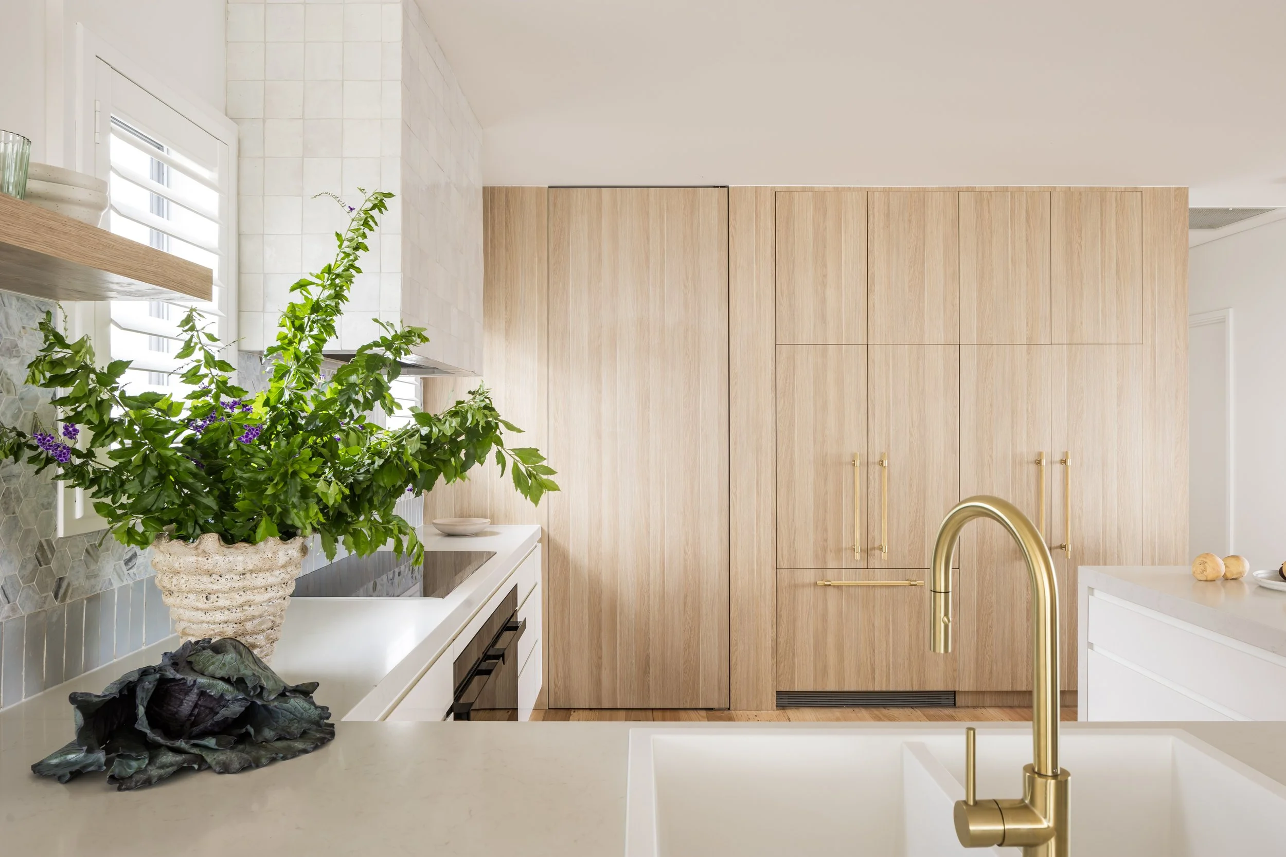 Brushed brass tapware and hexagon mosaic splashback, Shell Cove kitchen