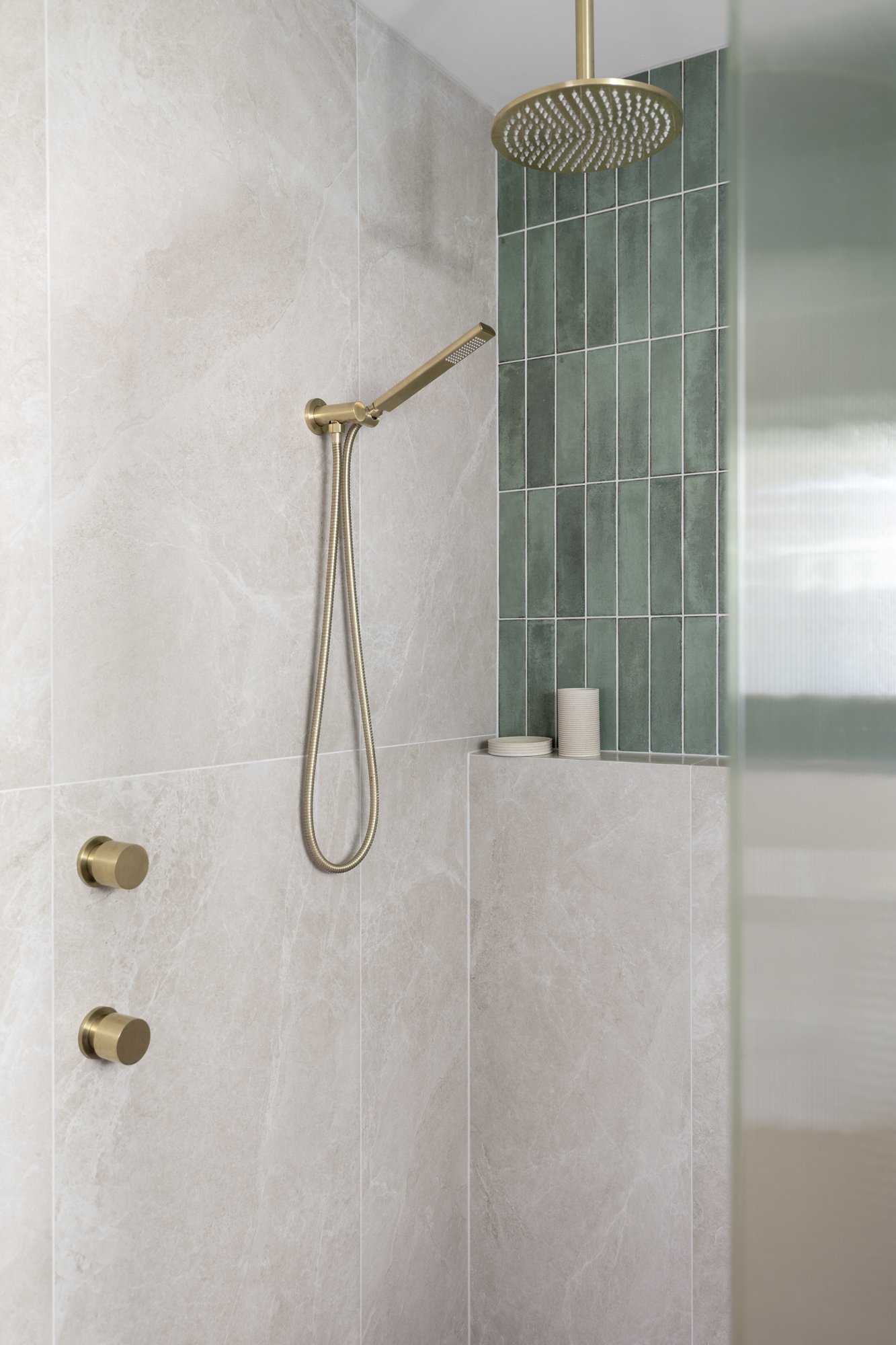 Ensuite shower with sage green tiles and brass fittings, Albion Park