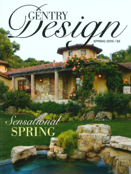 Cover of Gentry Design Spring 2009 magazine featuring a house with a stone and stucco exterior, surrounded by lush greenery and pink flowers, with a small pond in the foreground.