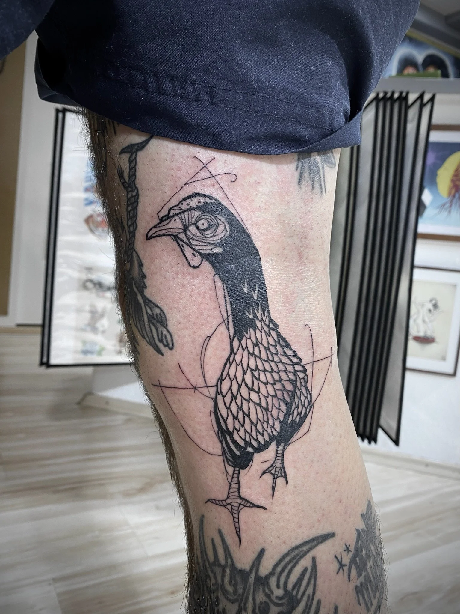 Illustratives Tattoo eines Huhns 