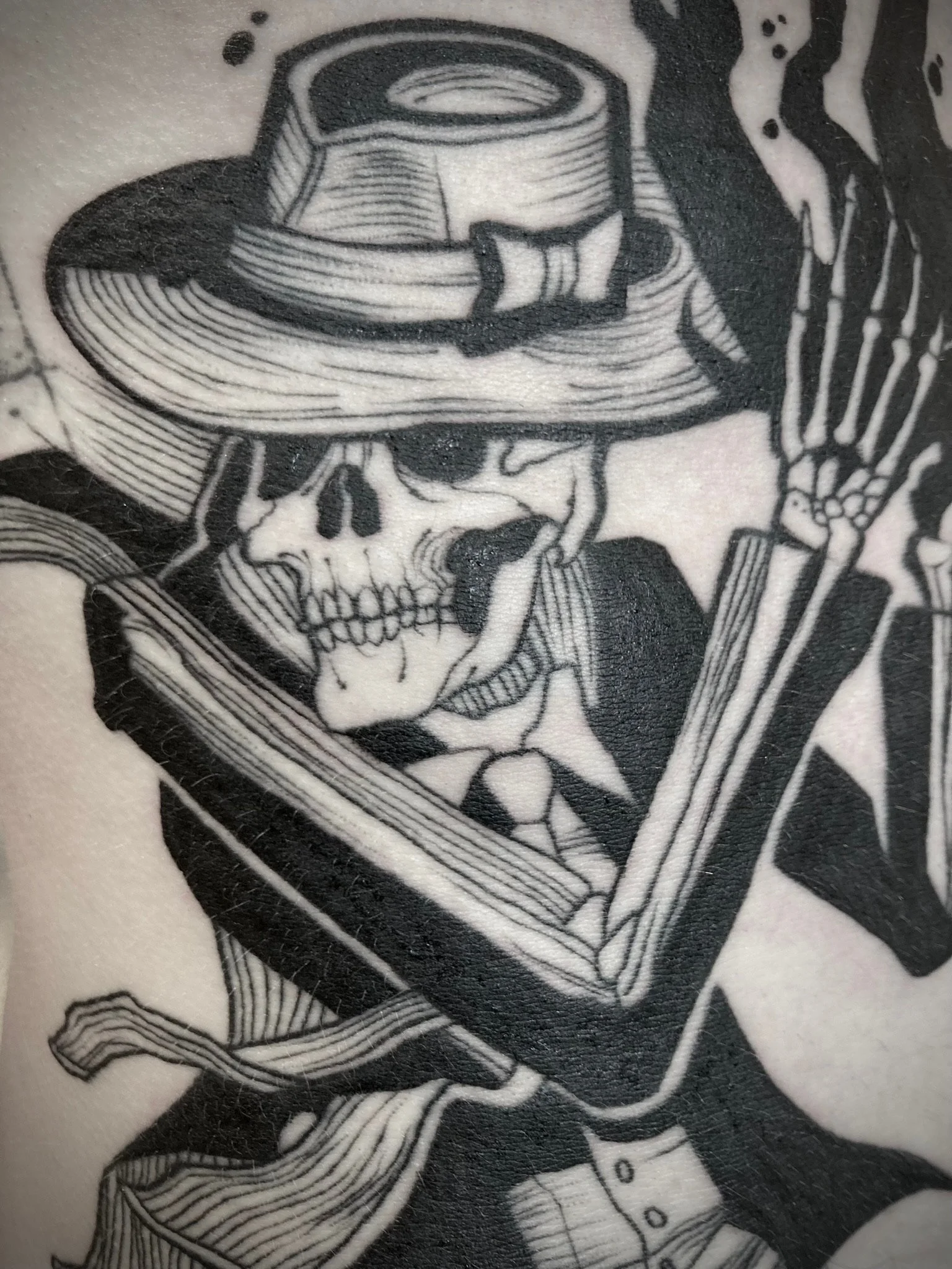 Blackwork Tattoo eines mexikanischen Skeletts