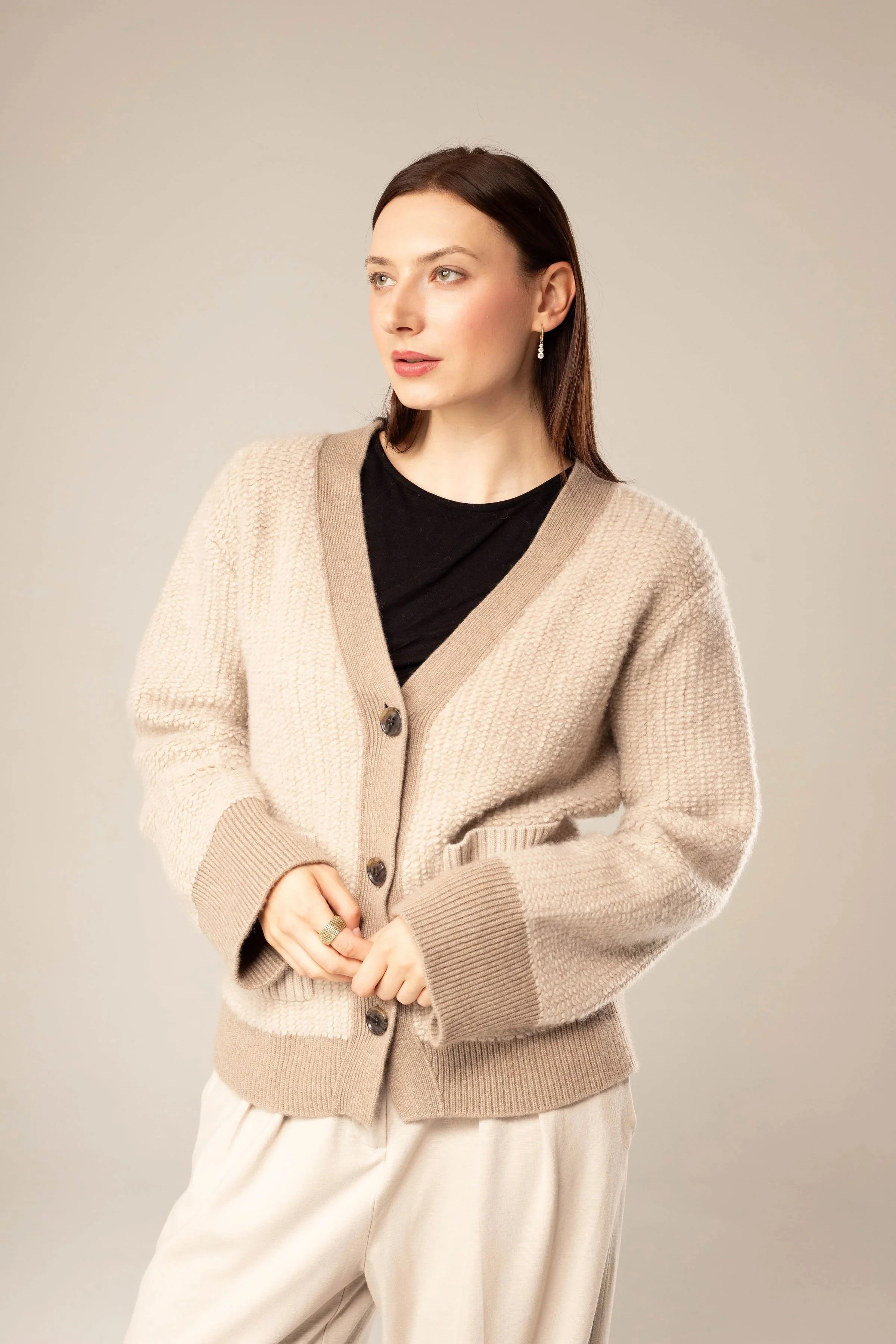 Lisa Yang 100% cashmere heavyweight cardigan in beige, medium to large fit, textured knit with a substantial feel. Pre-owned designer cashmere knitwear, excellent condition, no visible flaws or pilling. Modern minimalist style, timeless neutral knit.