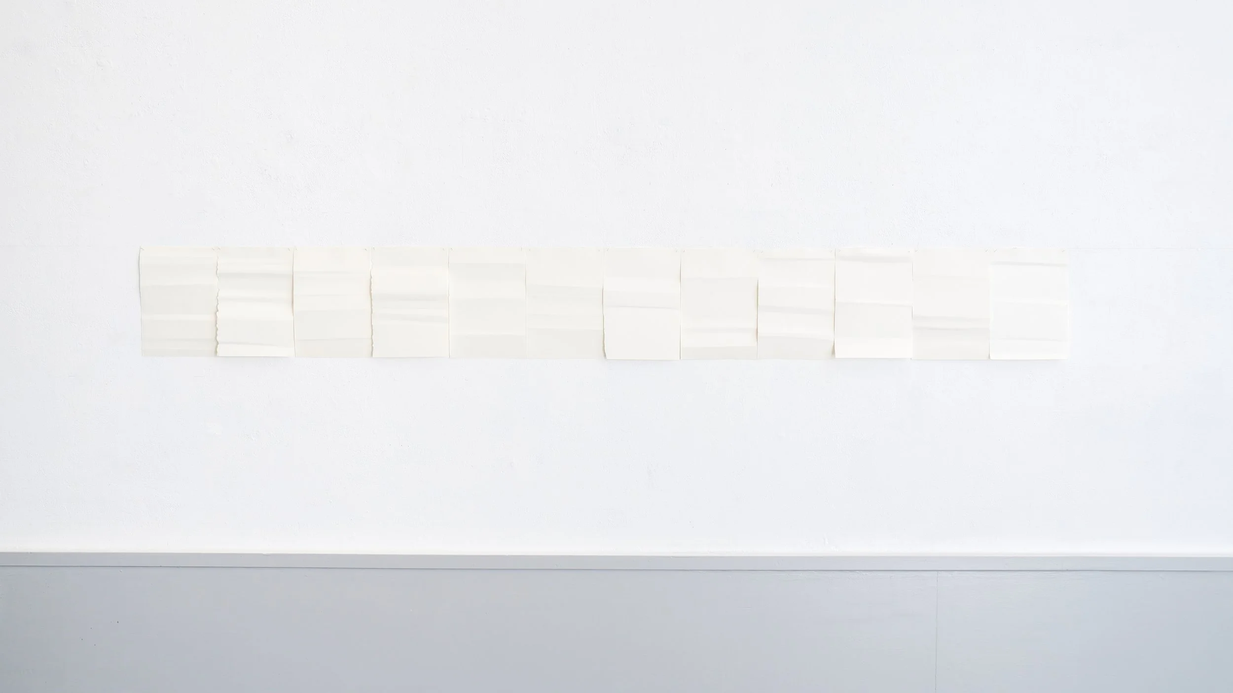 In verhouding. 2026 folded paper, 156 x 18 cm
Photo: Youri Ista