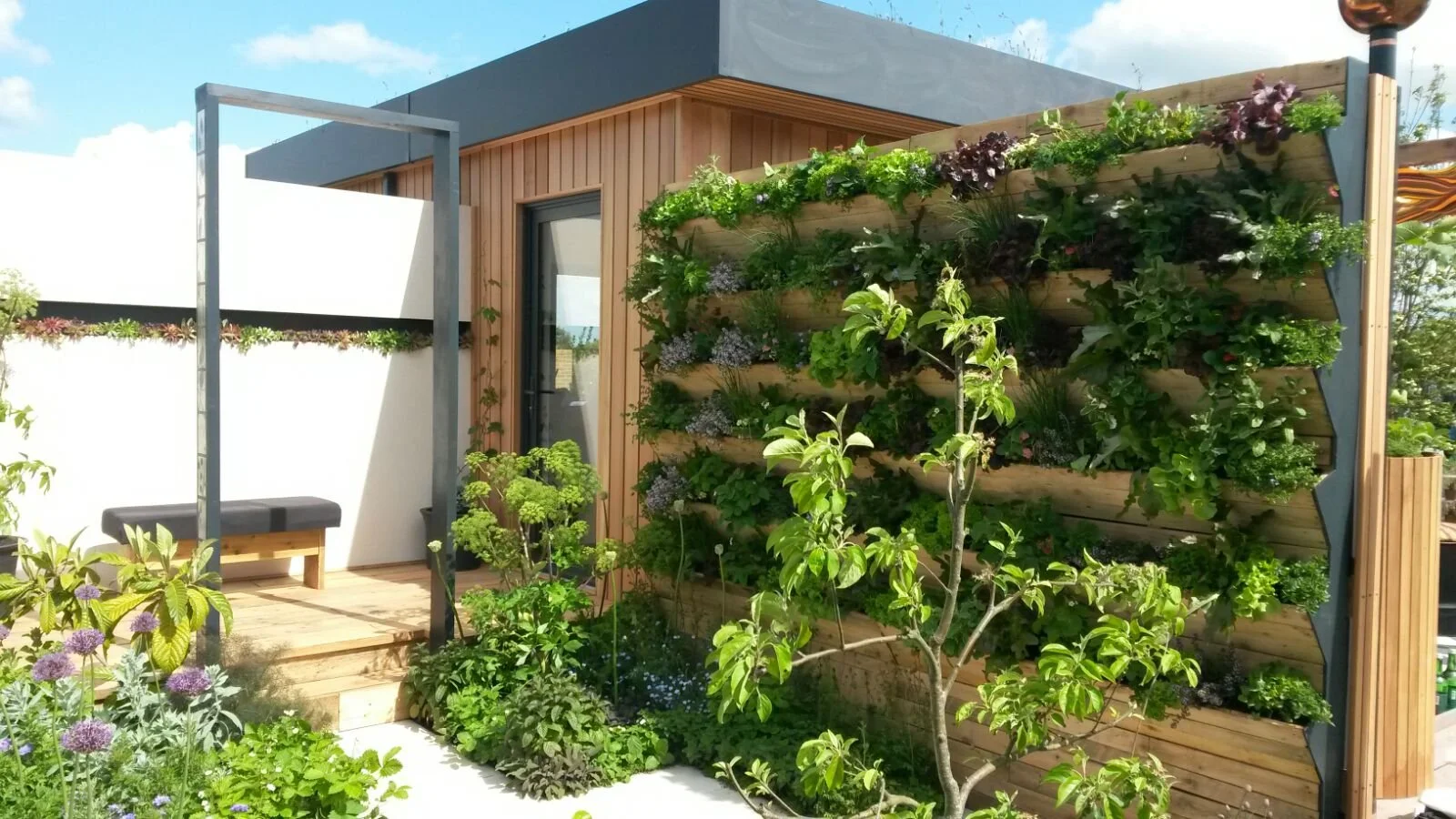 Award winning garden designer. RHS Malvern show garden. Edible Gardens