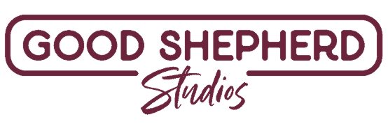 Logo for Good Shepherd Studios with the text in dark purple and cursive style.