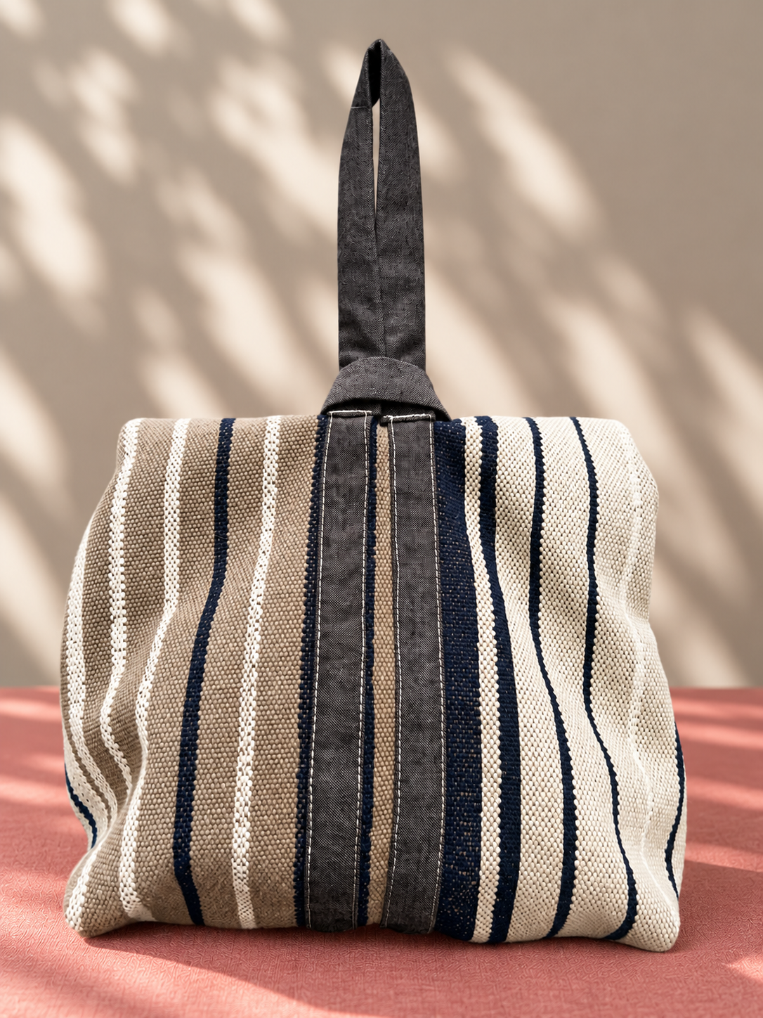 Striped Woven Bag in Dappled Light.png