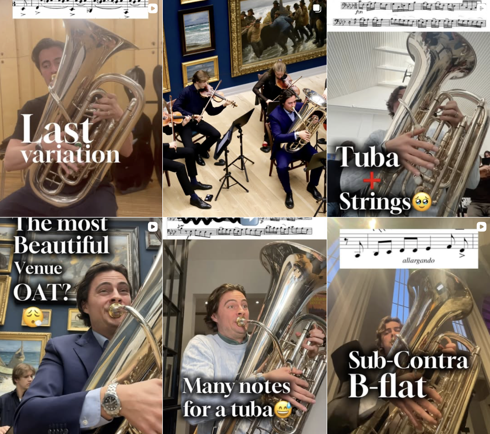 Several people are playing tubas indoors, with a wall adorned with paintings and a large window in the background. The individuals are dressed in formal and casual attire, and some are smiling while playing their instruments.