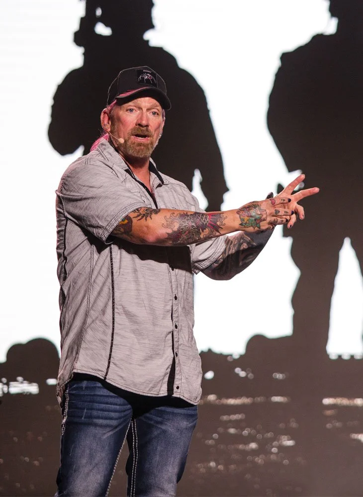 Navy SEAL veteran Darren McBurnett delivering a motivational presentation.