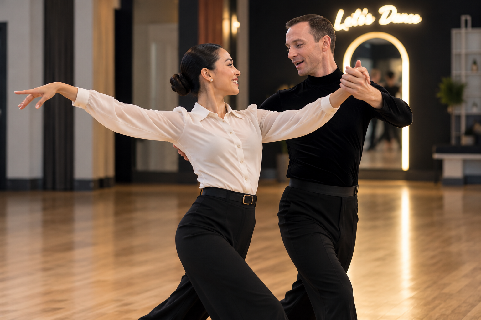 Dance partners practicing posture, frame, and connection in a ballroom hold