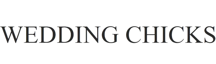 Sign with the words 'WEDDING CHICKS' in bold, metallic-looking letters