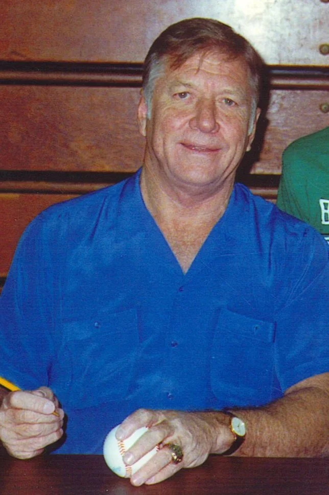 Mickey Mantle signing autographs at the Cobb County Civic Center in Marietta, Georgia, in 1988.