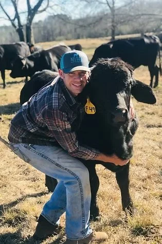 Evan Nelson — Vice President

Evan is a full-time farmer in McCalla and owner of Nelson Cattle & Hay, LLC. He produces feed and mulch hay, provides erosion-control services, raises beef cattle, and manages more than 1,500 acres in Jefferson County. H