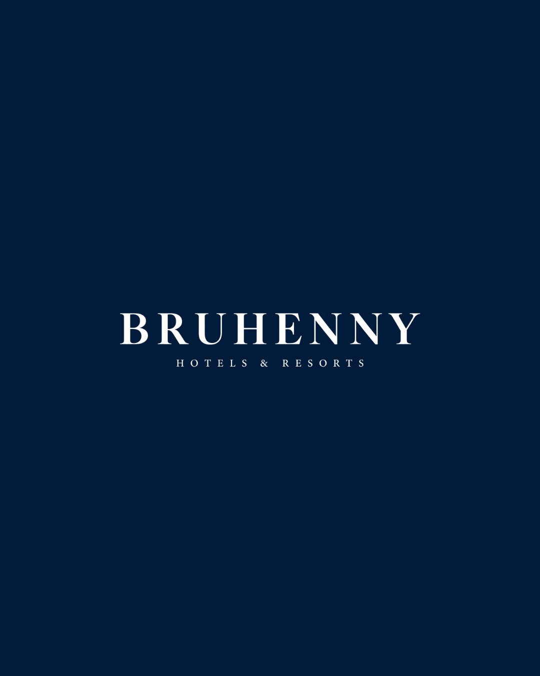Logo of Bruhenny Hotels & Resorts against a navy background.