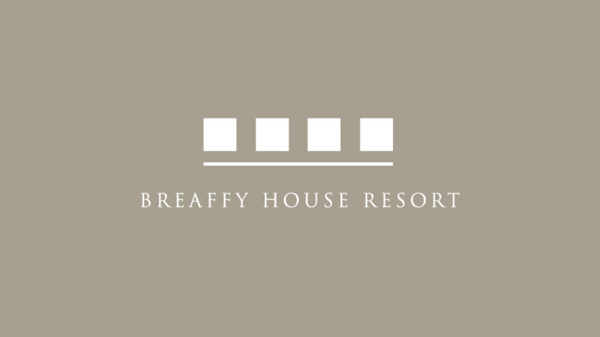 Logo of Breaffy House Resort with a stylized roof design and the resort name beneath, on a beige background.