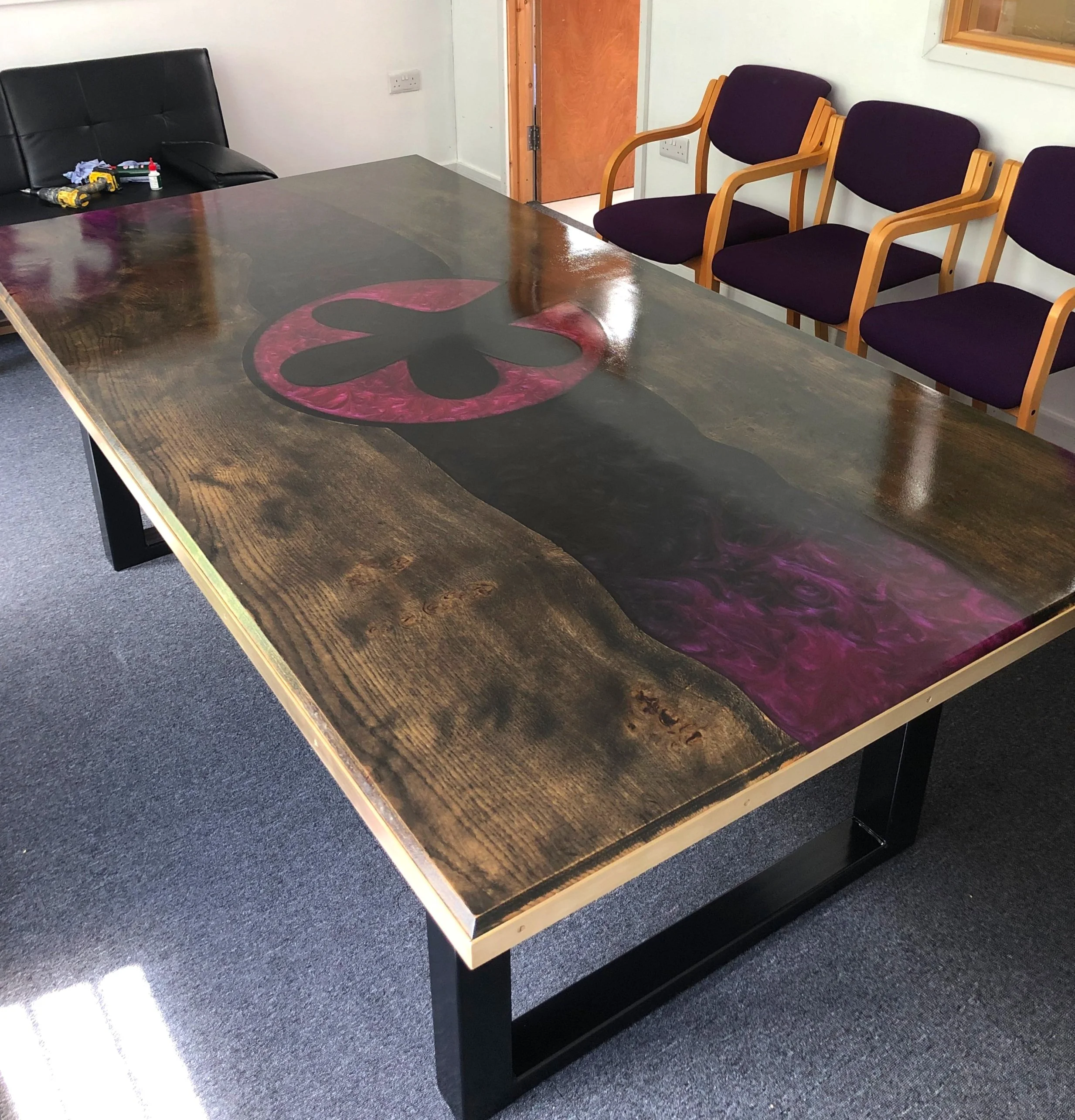 Epoxy resin river and logo design conference table