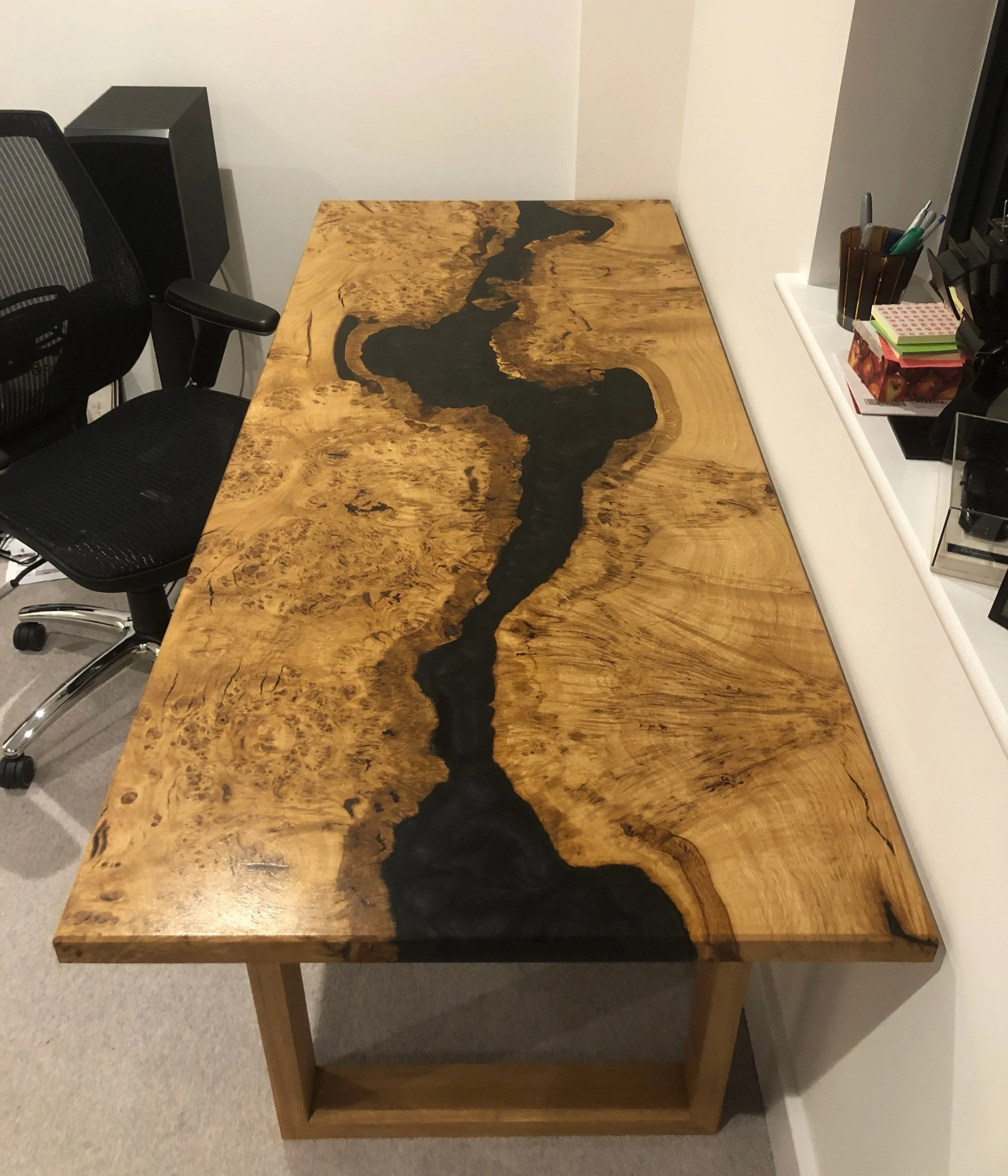 Epoxy resin river design desk with pippy oak and metallic black resin river