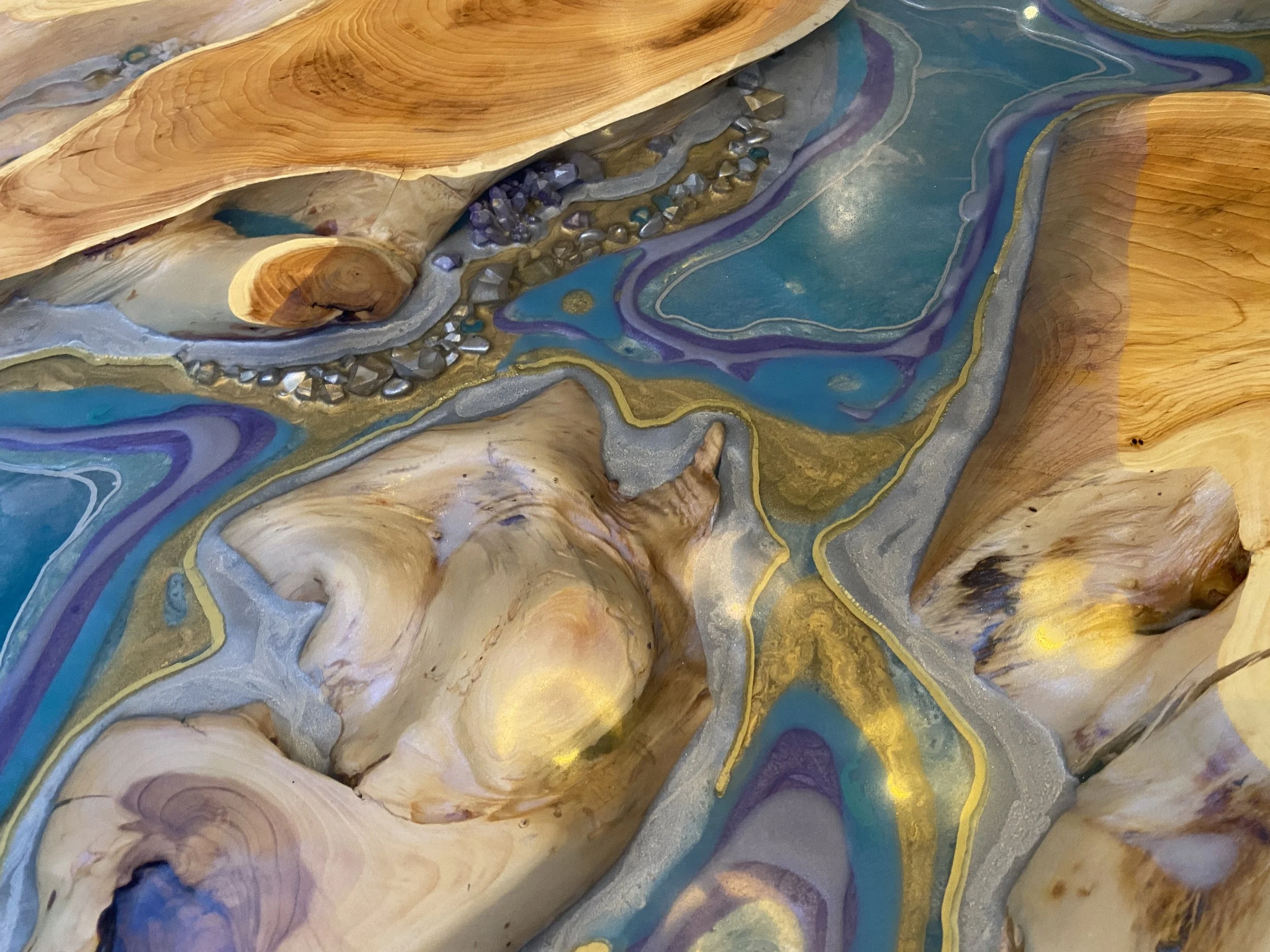 Epoxy resin geode style dining table detail