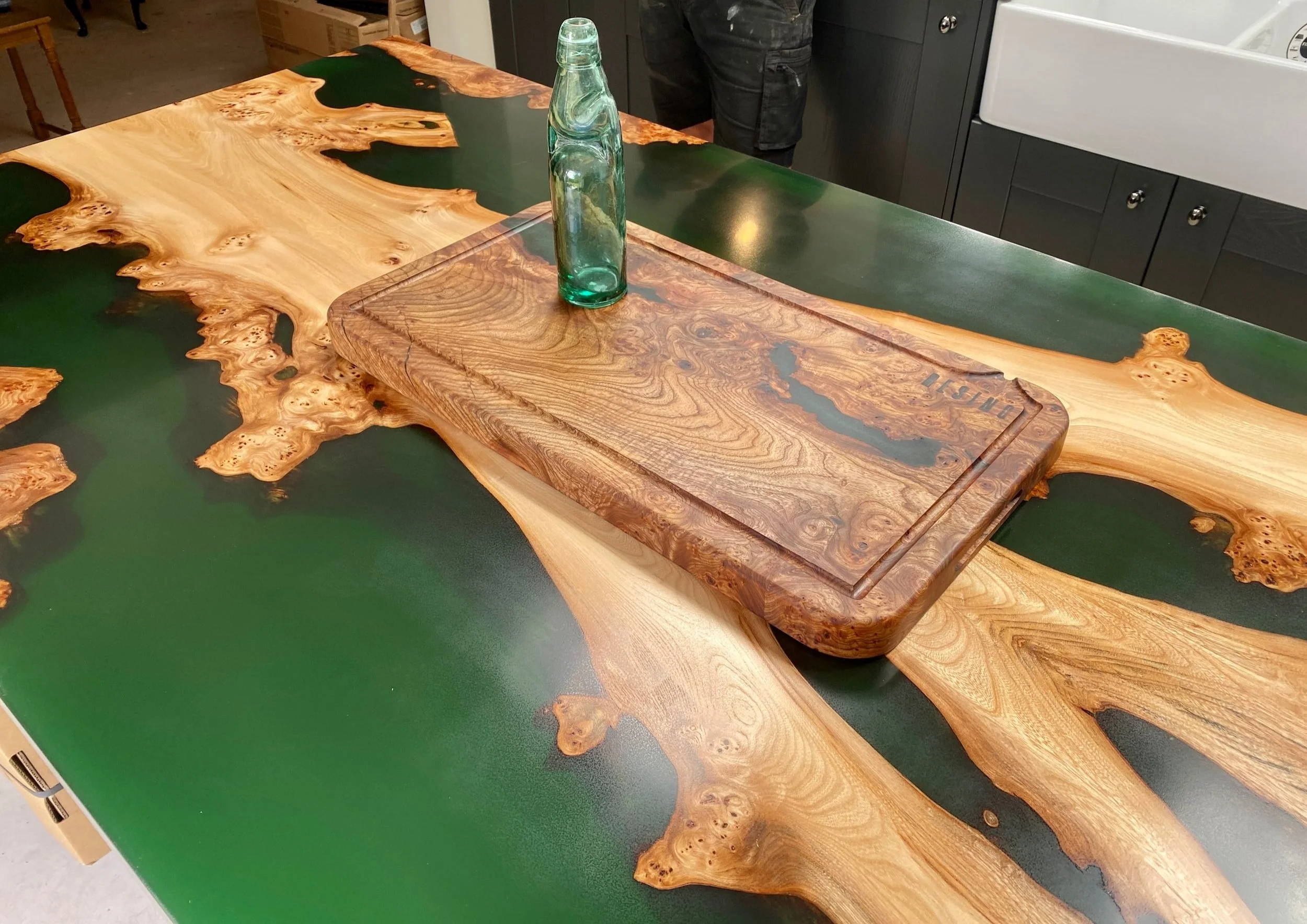Bottle green epoxy resin kitchen island and chopping baord