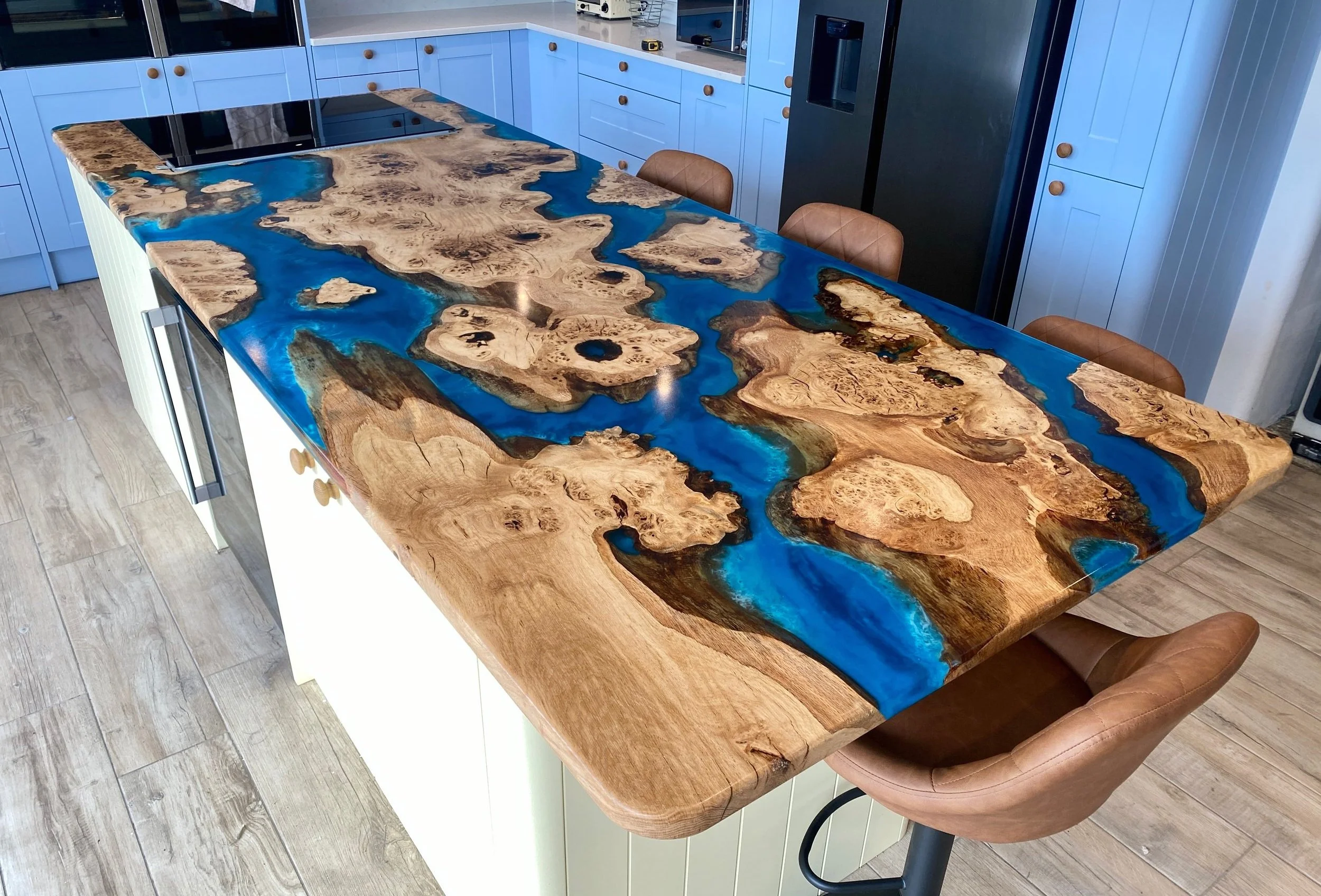 Ocean effect kitchen island with islands of oak wood and epoxy resin sea effect