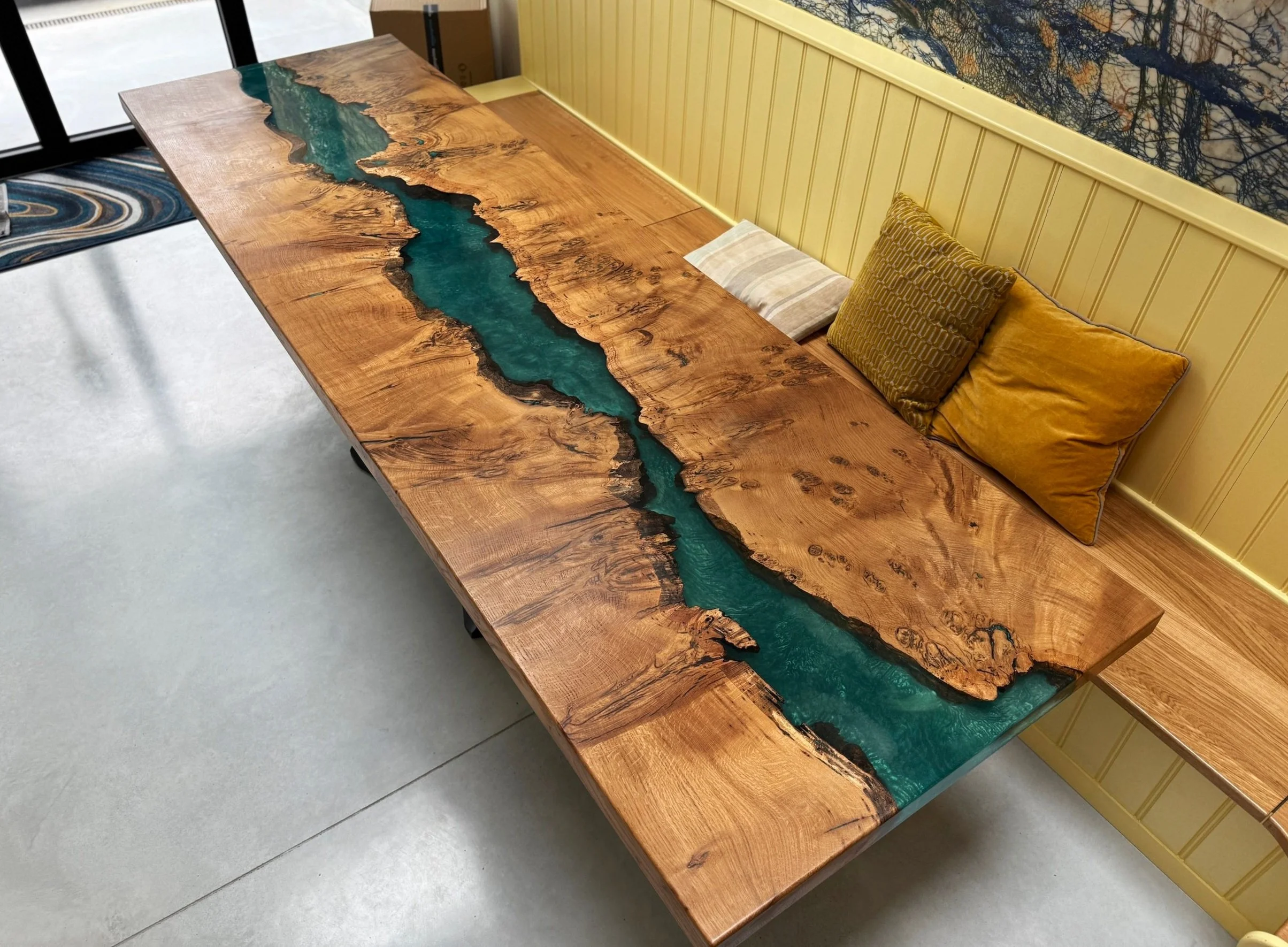 Large oak and resin river table with teal colouring