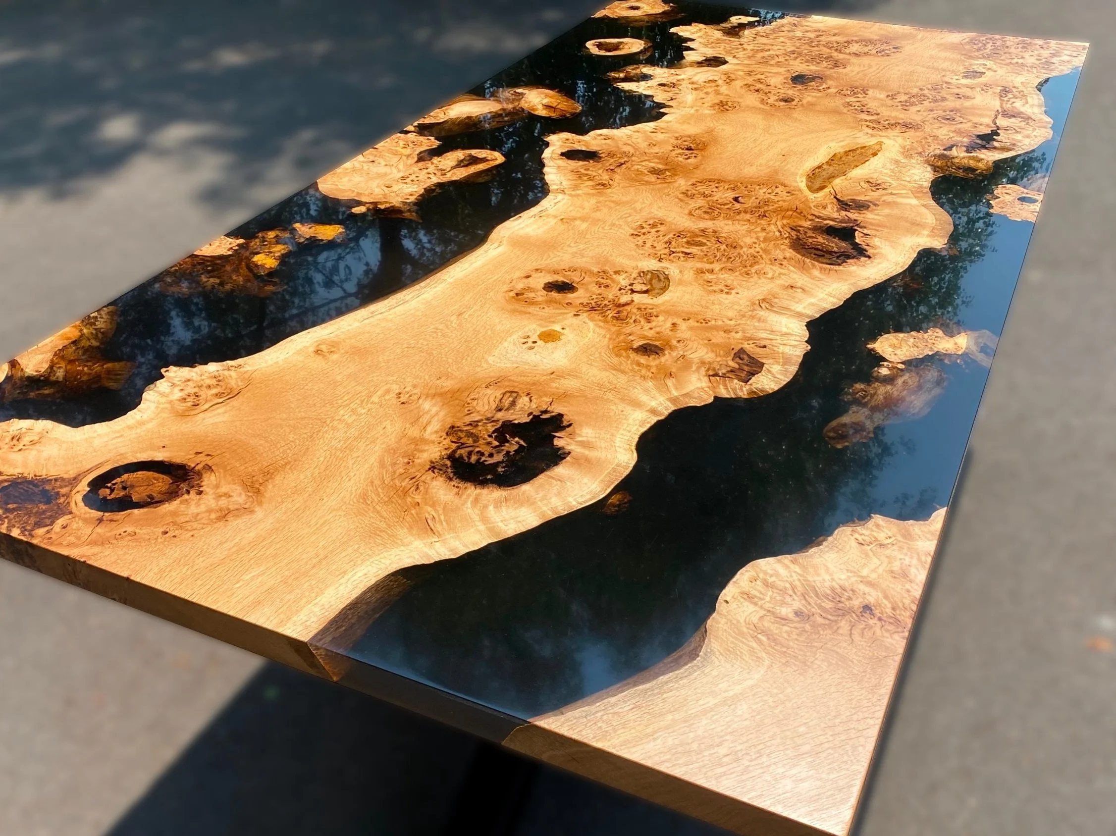 Black Tint Epoxy and Pippy Oak Dining Table with Star Base