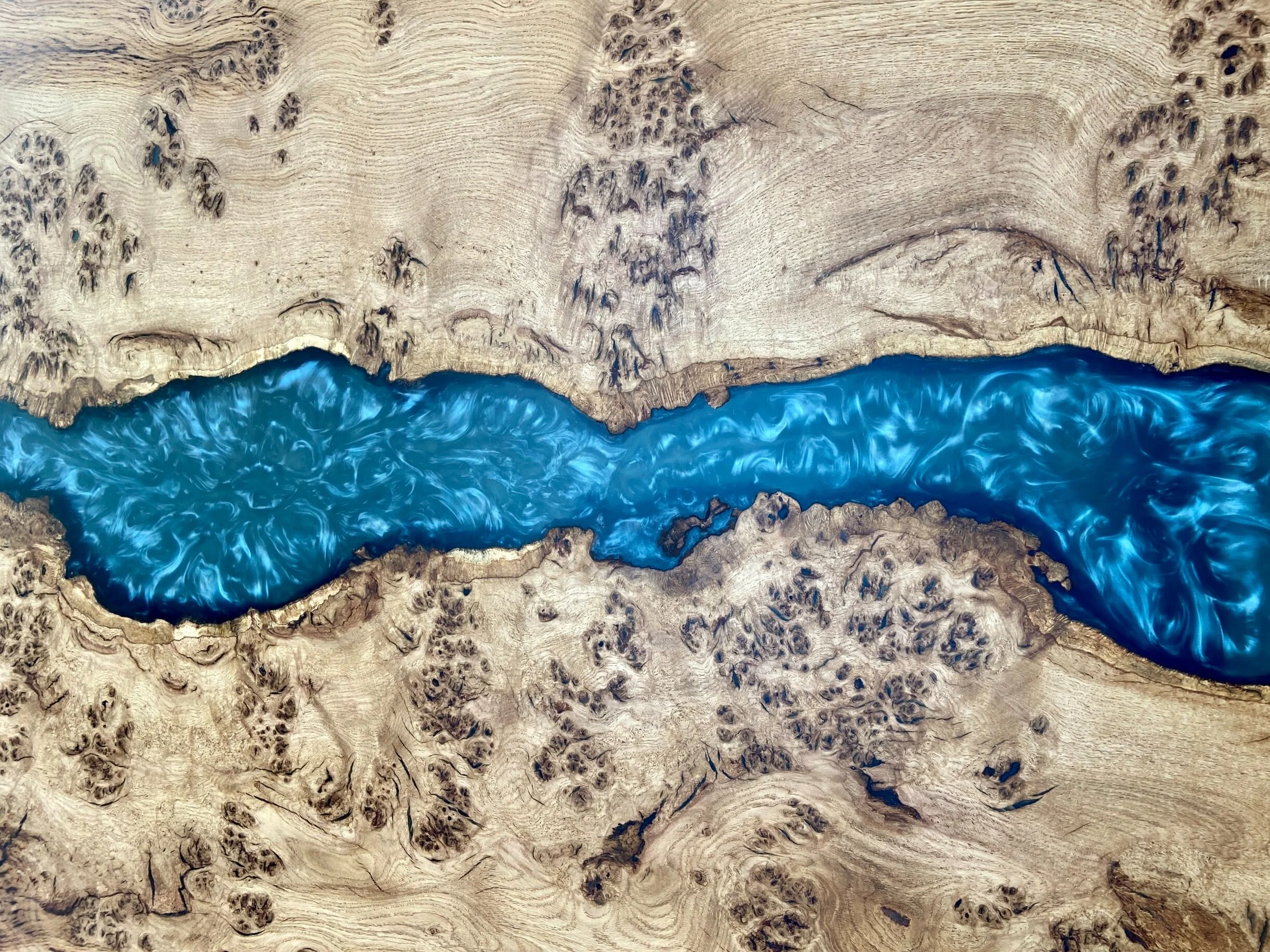 river table birds eye view showing oak and blue river effect