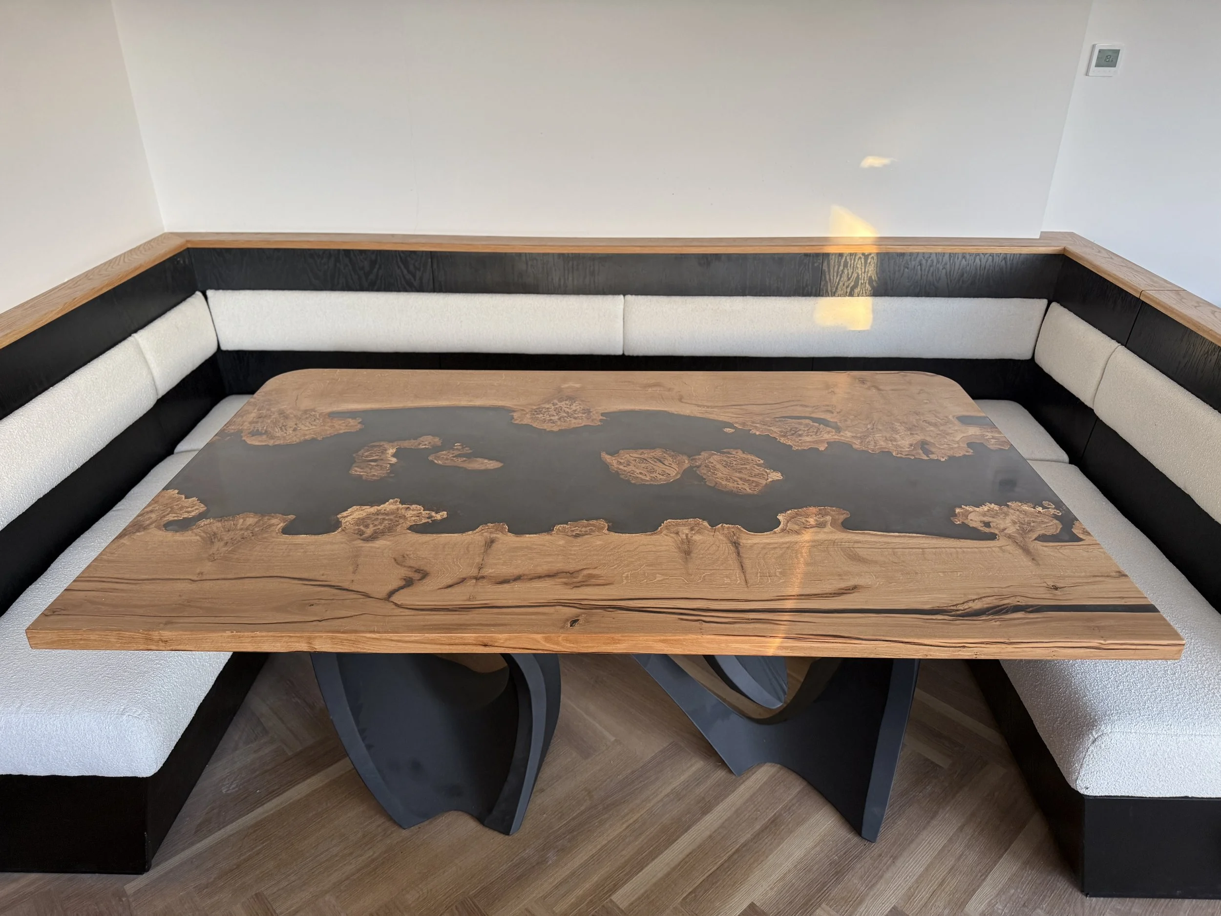 Smoky Black and Silver Dining Table With Curved Steel Legs