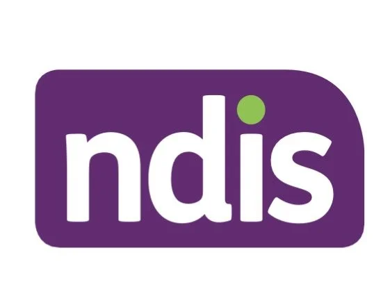 NDIS logo with purple background and white lowercase letters, green dot above the 'i'.