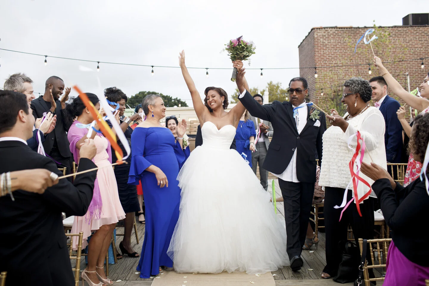 Bride Celebrating entering her Luxurious Brooklyn Rooftop Wedding (Copy)