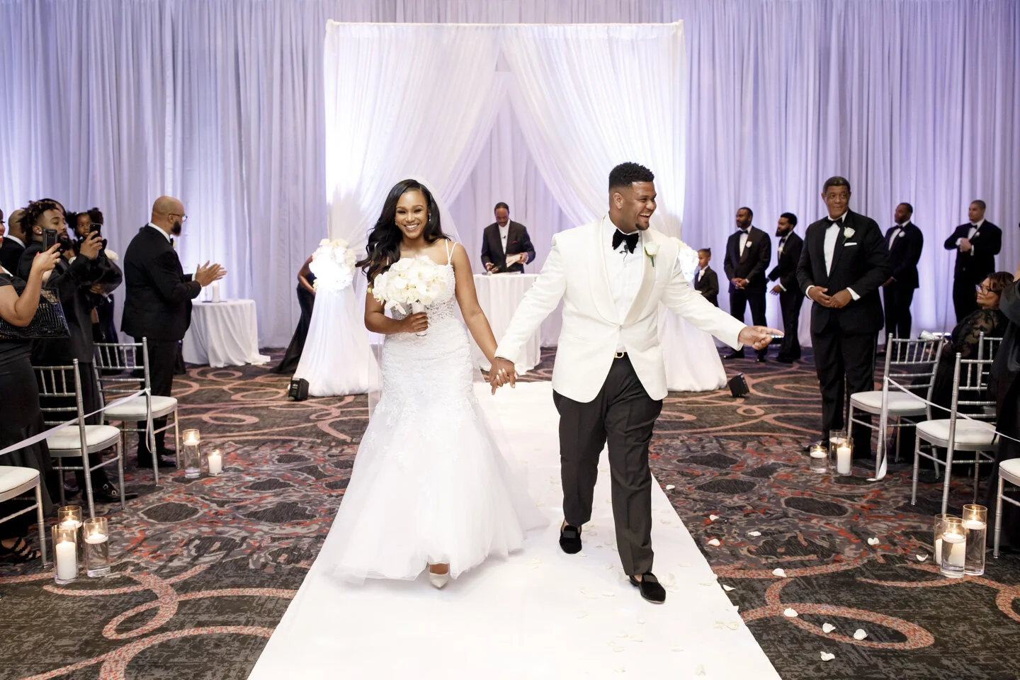 Bride and Groom Celebrating at The Hotel at the University of Maryland Wedding (Copy)