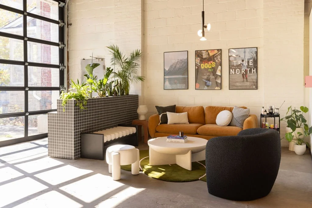 Farmhouse Creative Labs lounge with custom tile planter and soft seating