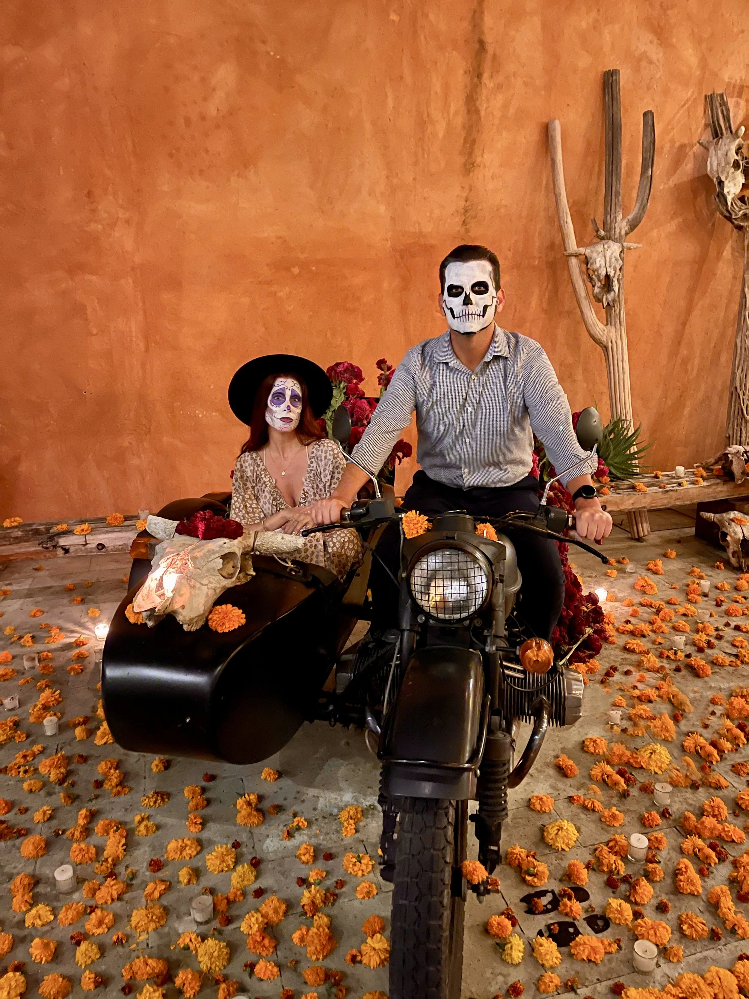 Ashley Martinez and Cheryl with faces painted in traditional dia de los muertos in Oaxaca.