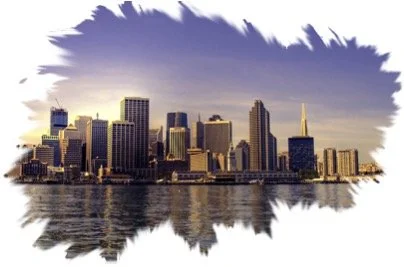 Skyline of downtown San Francisco with buildings and water in the foreground.