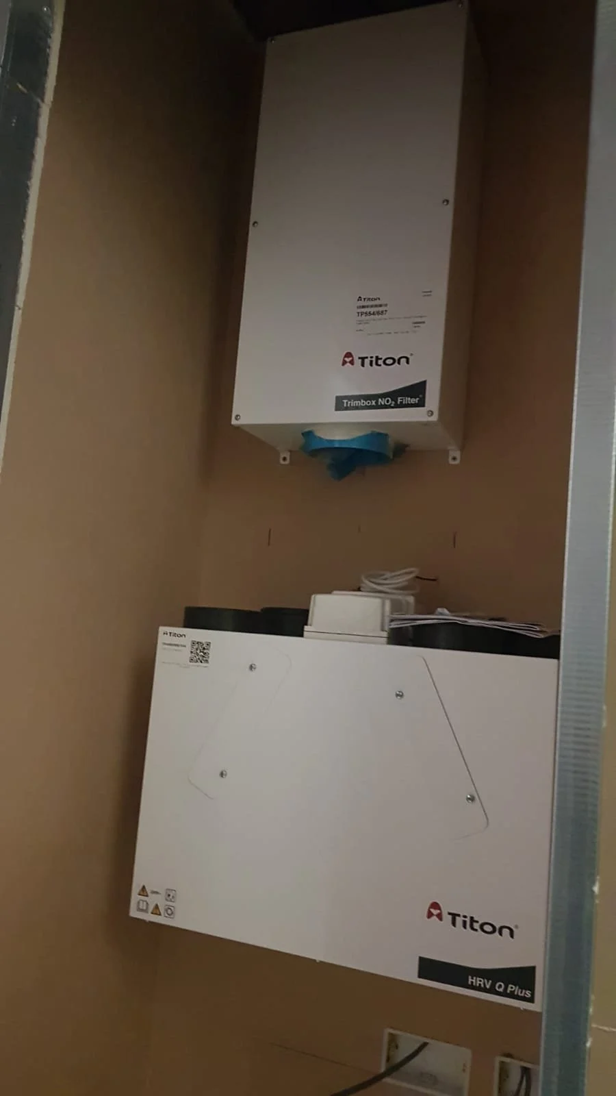Titon ventilation system with HRV Q Plus unit and Trimbox NO₂ filter mounted inside a utility cabinet