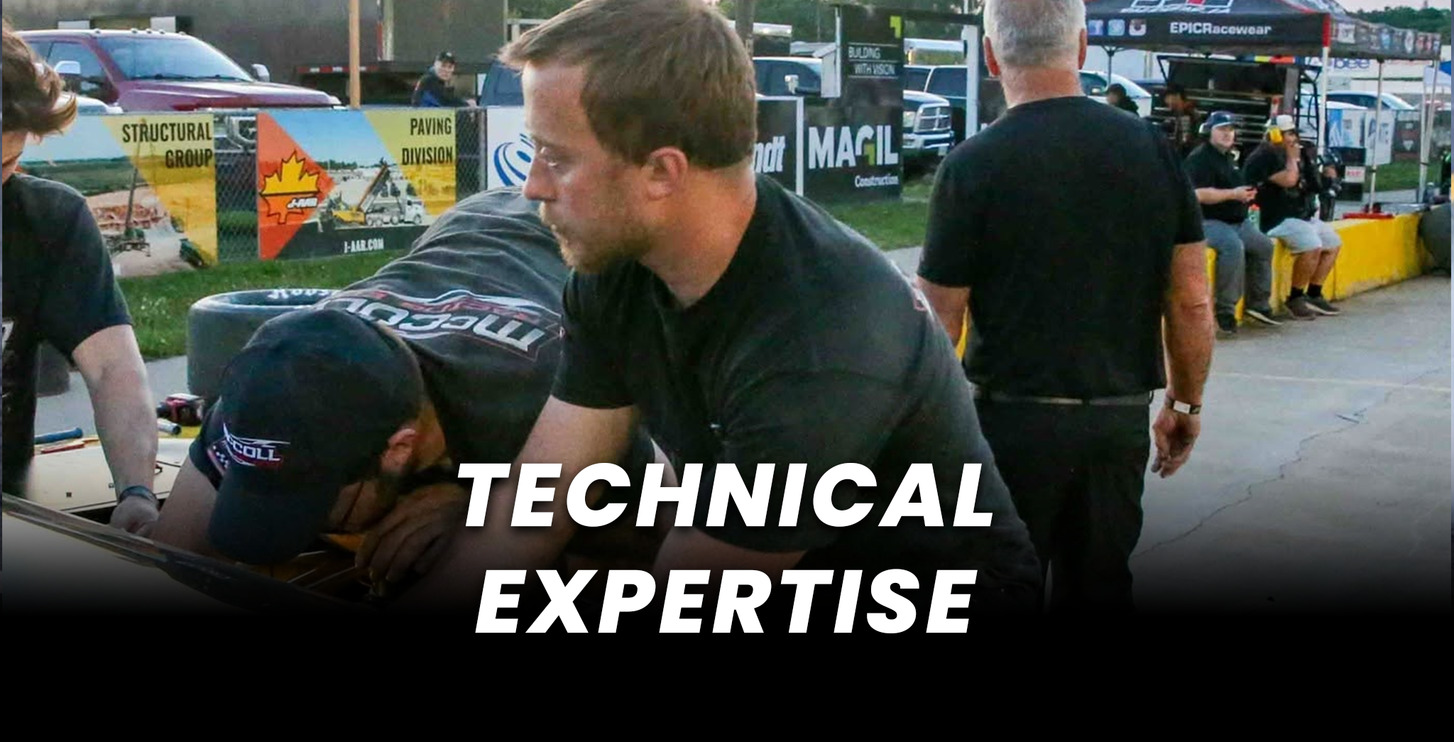 Motorsports crew members work on a race car at the track with “Technical Expertise” text overlay.