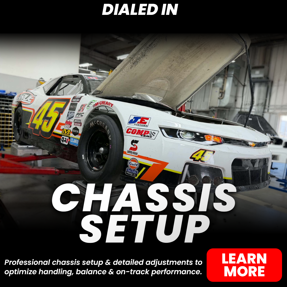 White No. 45 race car on a lift with its hood open, promoting professional chassis setup and handling adjustments.