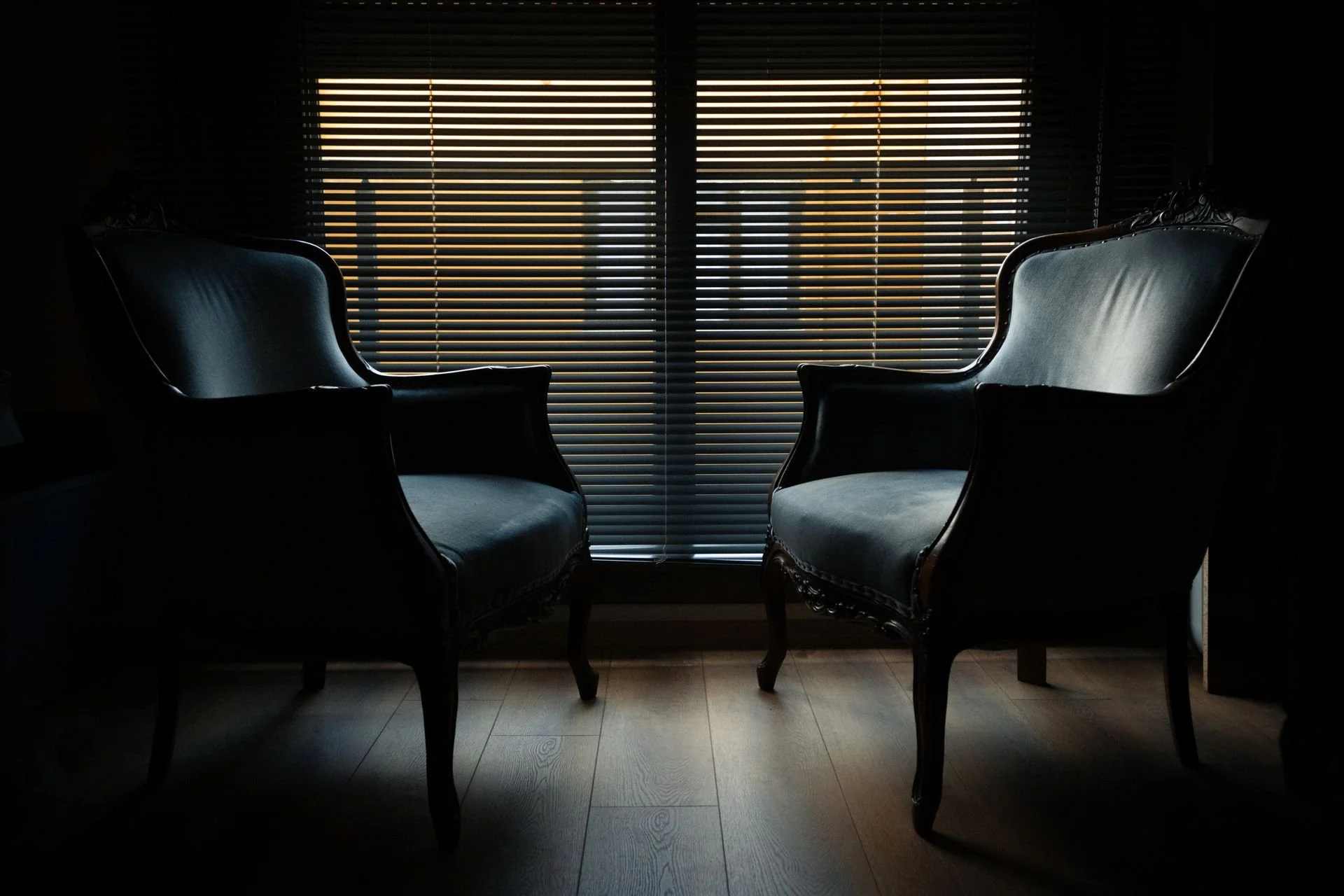 two chairs facing each other in a quiet room