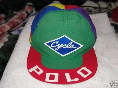Colorful cycling cap with a green front, a red brim labeled 'POLO,' and a blue diamond-shaped logo with the word 'Cycle' on it.