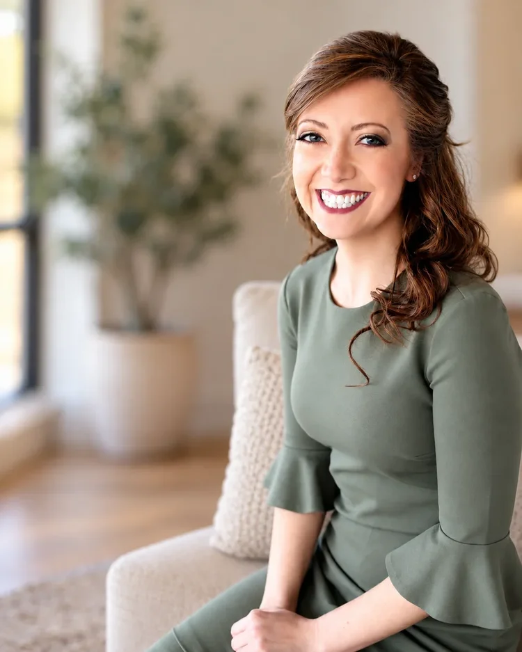 Dr. Hannah Spiker in a sage dress