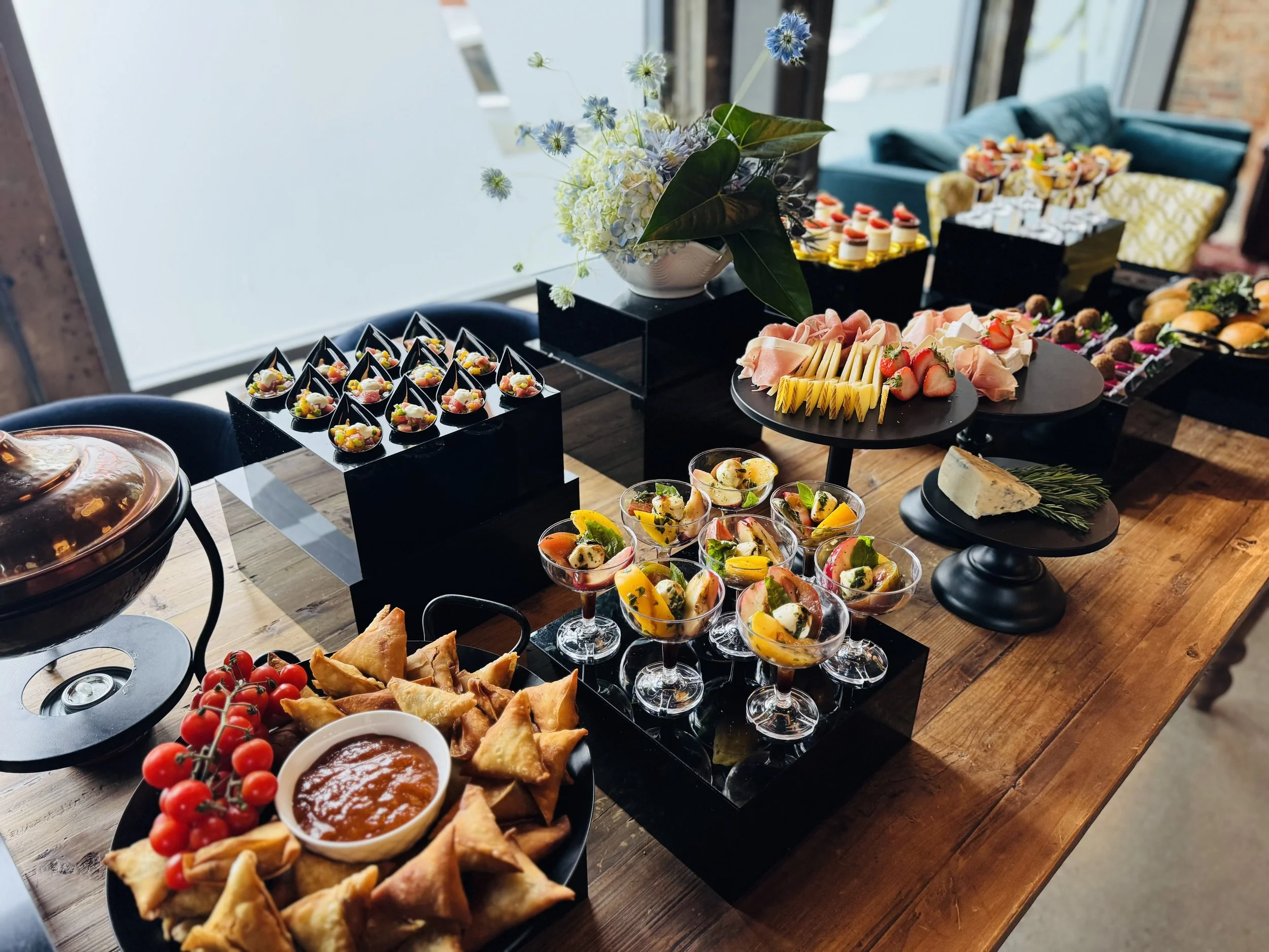 Passed hors d'oeuvres and dessert display for a corporate event by Catering by Rotem
