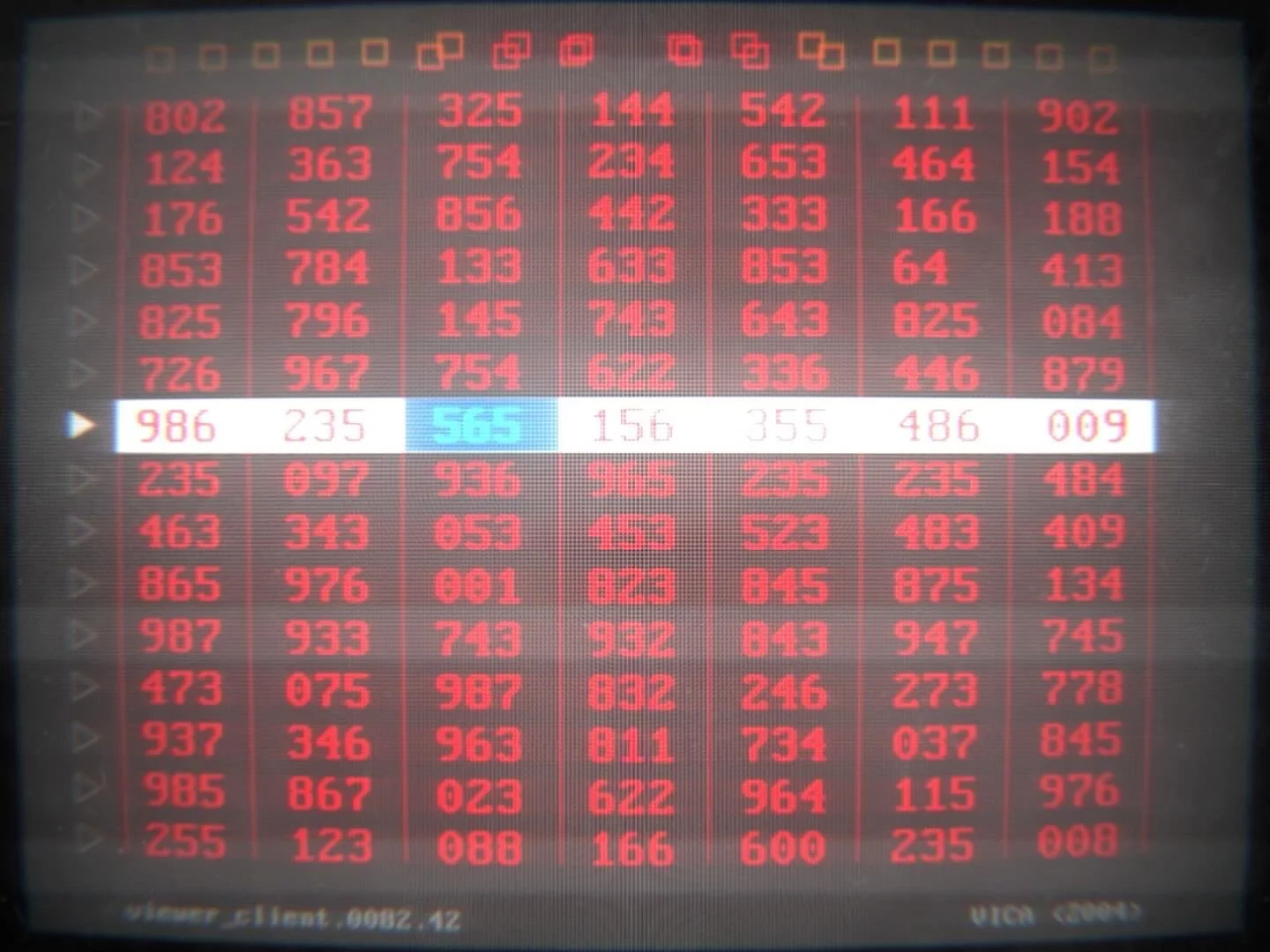 LED display board showing a grid of red and blue numbers. From the movie the Shift