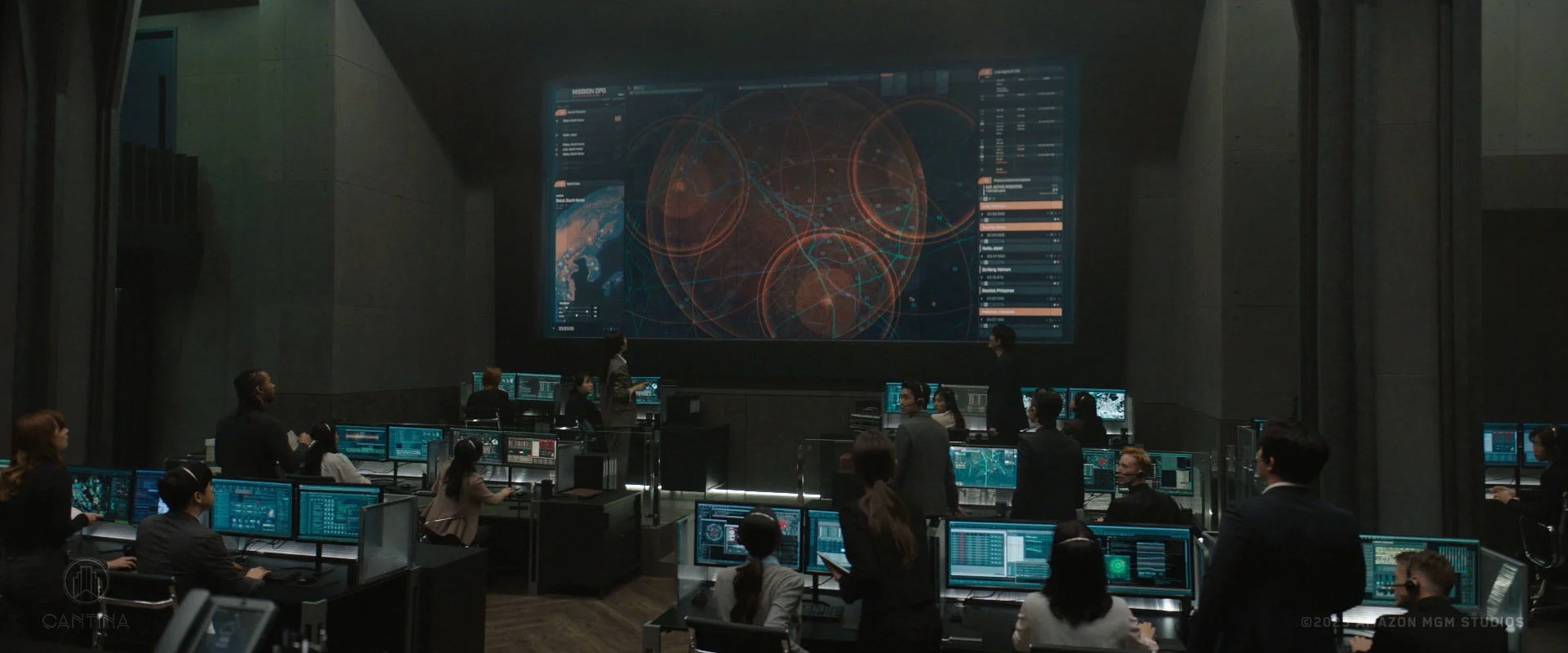 CADDIS HQ control room with analysts at a large wall display — Butterfly FUI and screen graphics by Darby Faccinto