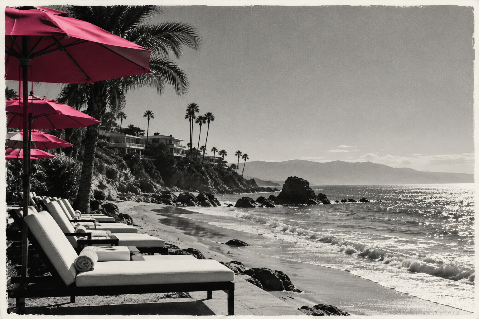 Photo of beach resort with pink umbrellas.