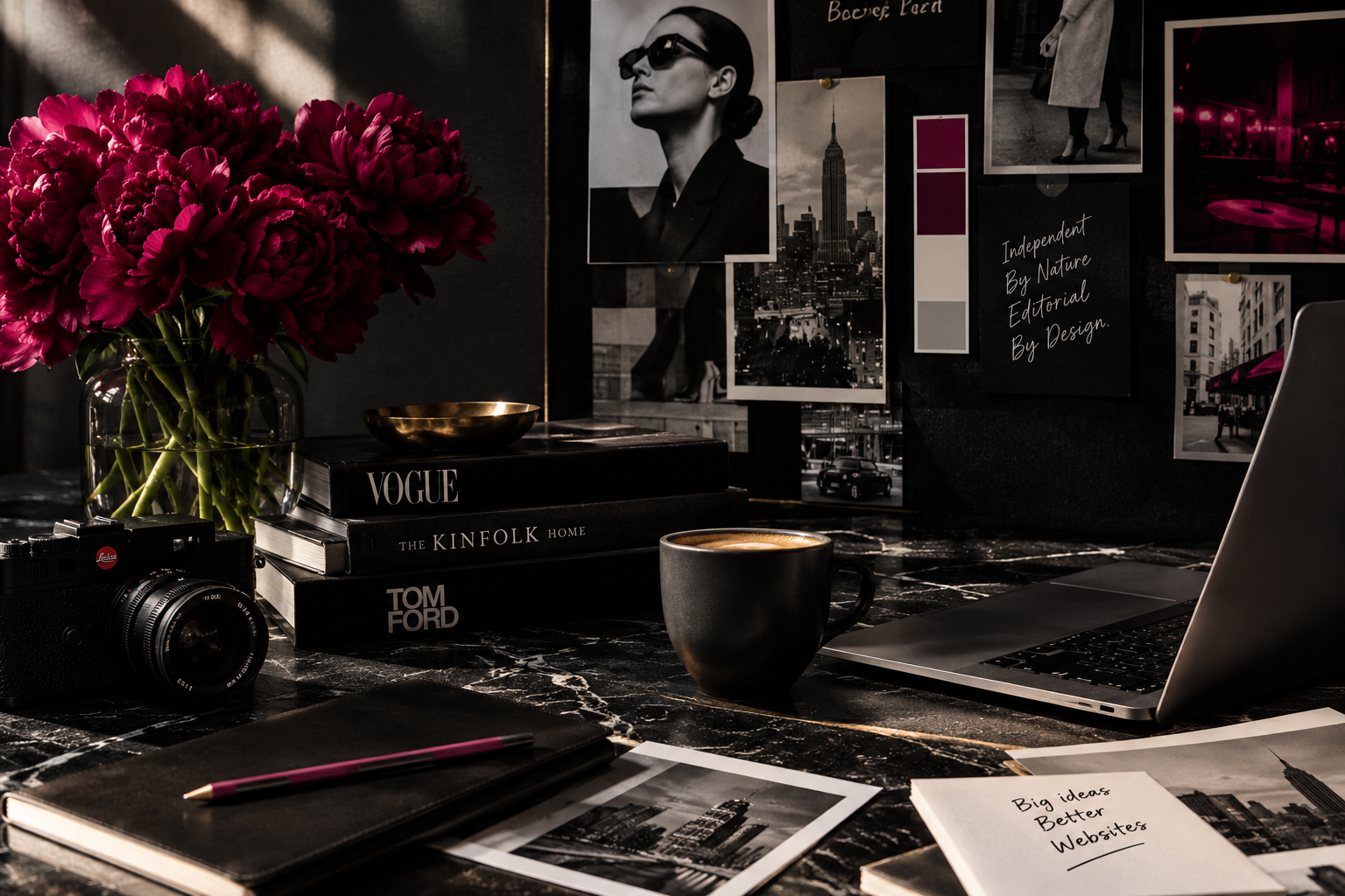 Editorial creative workspace with table books red flowers and portrait.