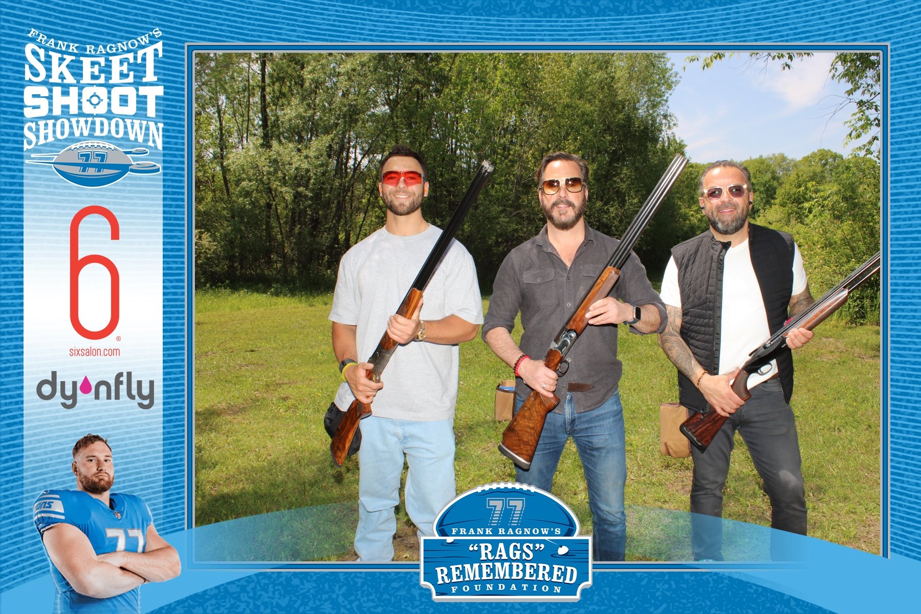 Three men posing outdoors with rifles, standing on grass with trees in the background, at the Rags Remembrance Foundation event, sponsored by Sixsalon and Dynfly.
