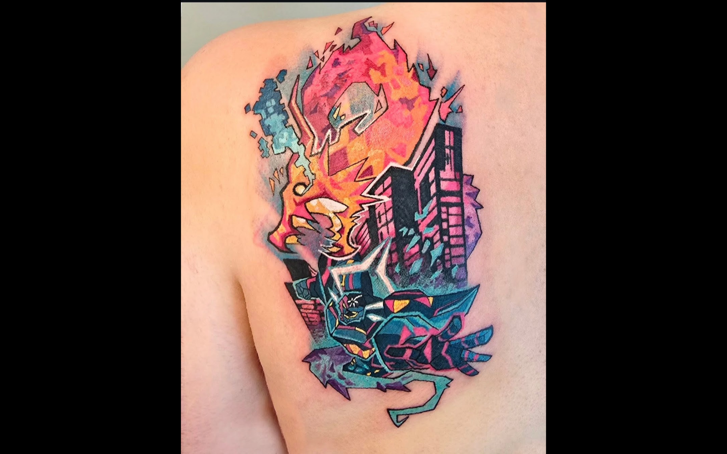 Colorful tattoo of a cityscape with a dragon head on the upper arm