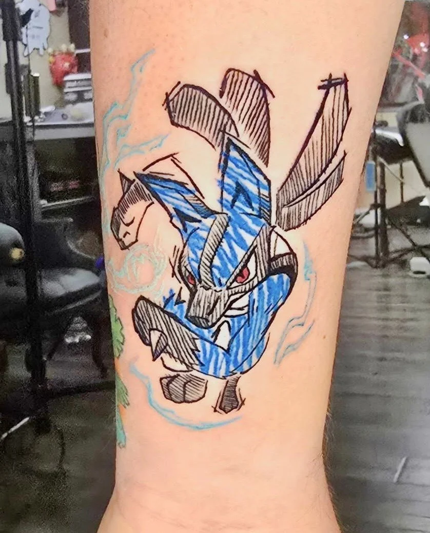 Tattoo of a dragon with blue and black lines, red eyes, and lightning effects around it.