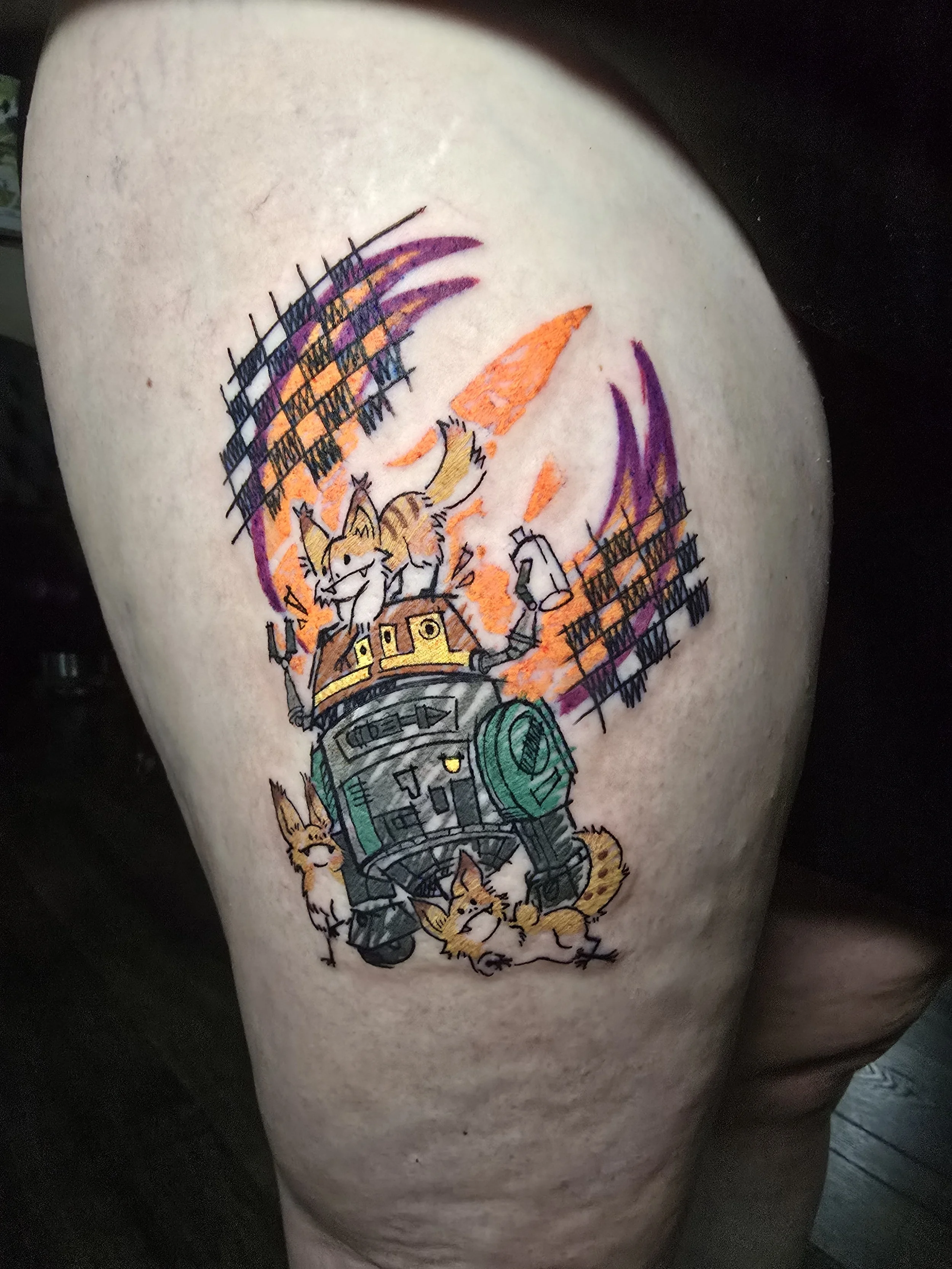 Colorful tattoo featuring a cartoonish creature, possibly a dog or fox, with a large head and multiple smaller animals, on person's skin.