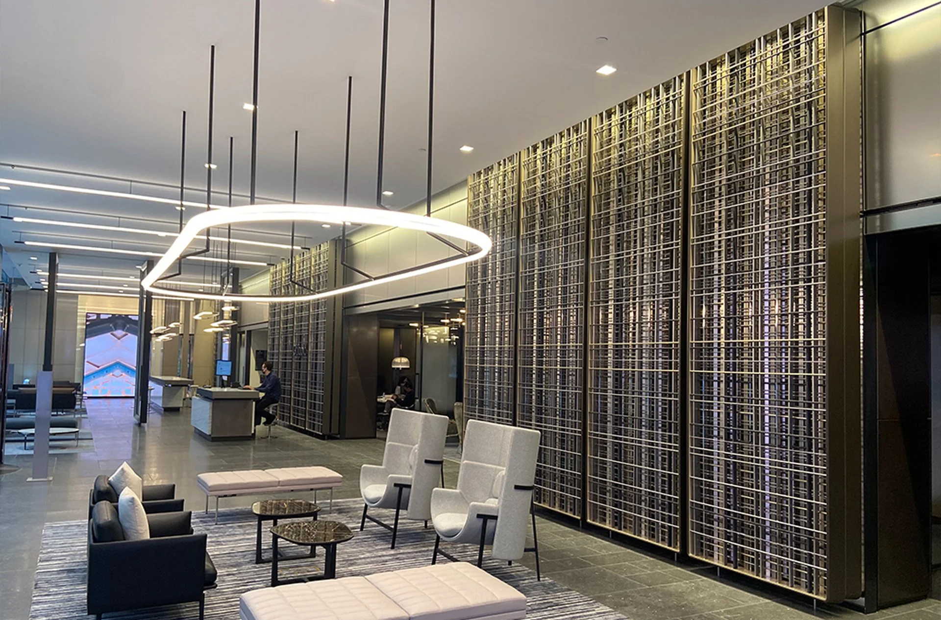 These seventeen decorative full-height metal lattice screens were made for the Citibank HQ. They cover 1,600 sq ft, integrating various custom wood and anodized, brass and SS mirror finishes.